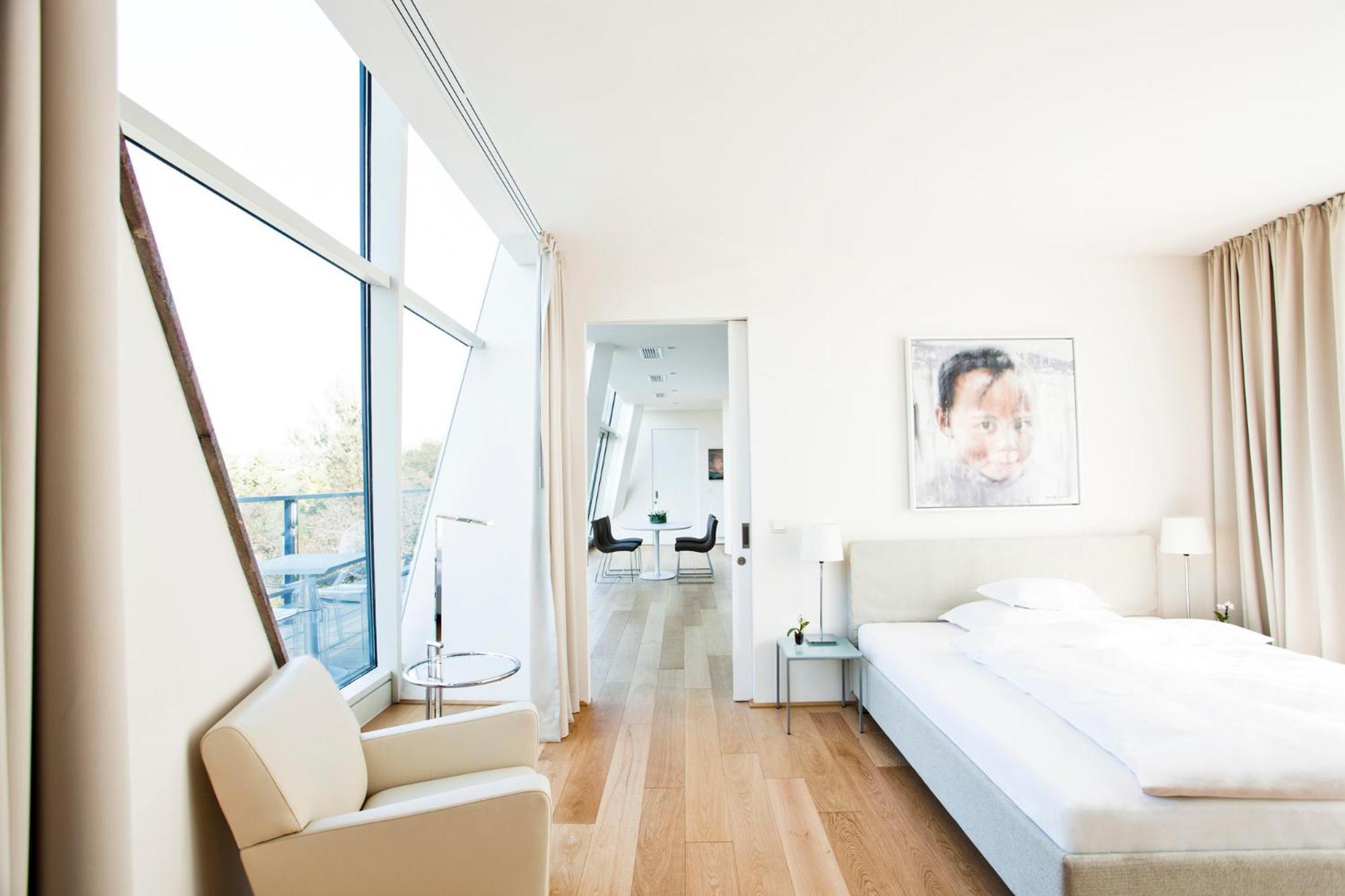 Schlossberghotel Graz Ngoại thất bức ảnh A room at the Hotel Mandarin Oriental Munich